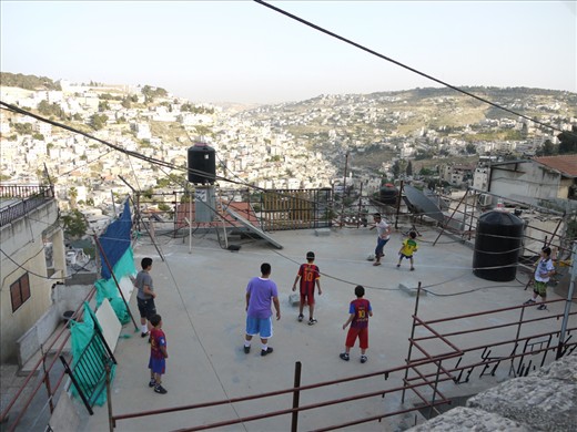 #3 A Perfect View from the Grandstand:  Just outside the old city walls, I was lucky enough to get the perfect seat for this very important match, battled out alongside the sun-drenched hills at sunset. The crowd was disappointing for such an important match, but it didn’t affect the passion or brilliance exhibited throughout. The crowd was somewhat stunned when they noticed three Lionel Messi’s on the pitch. The opposing team subsequently remonstrated loudly with officials, ‘How can a 4 time Ballon d’Or winner appear on the same team three times?!’. The referee dismissed their calls and pressed on with the game. The match went on for much longer than the standard 90 minutes, eventually having to be abandoned due to low light and exhausted players. Unsurprisingly, the Messi’s won convincingly.