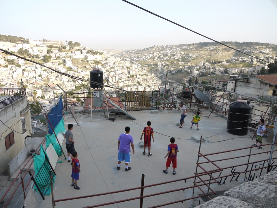 #3 A Perfect View from the Grandstand:  Just outside the old city walls, I was lucky enough to get the perfect seat for this very important match, battled out alongside the sun-drenched hills at sunset. The crowd was disappointing for such an important match, but it didn’t affect the passion or brilliance exhibited throughout. The crowd was somewhat stunned when they noticed three Lionel Messi’s on the pitch. The opposing team subsequently remonstrated loudly with officials, ‘How can a 4 time Ballon d’Or winner appear on the same team three times?!’. The referee dismissed their calls and pressed on with the game. The match went on for much longer than the standard 90 minutes, eventually having to be abandoned due to low light and exhausted players. Unsurprisingly, the Messi’s won convincingly.