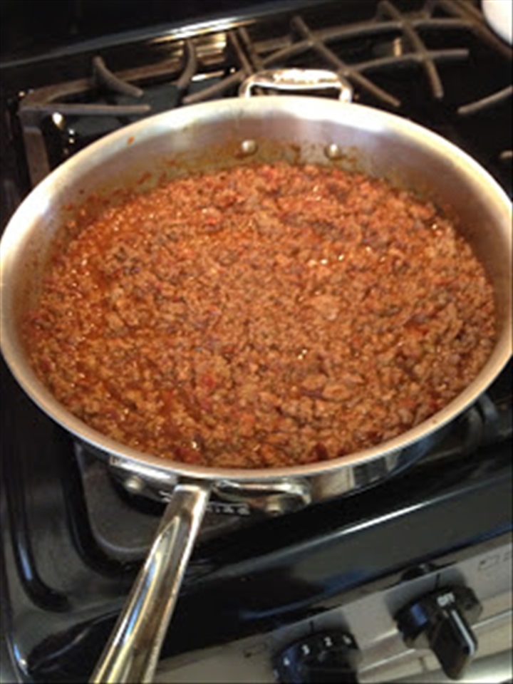 Frito pie meat simmering.