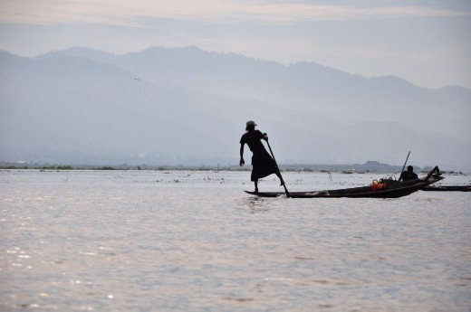 Inle Lake, home to Inca leg rower. Toiling their heart out in rowing. 