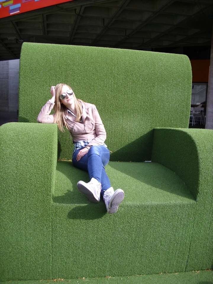 Sitting in a giant armchair
