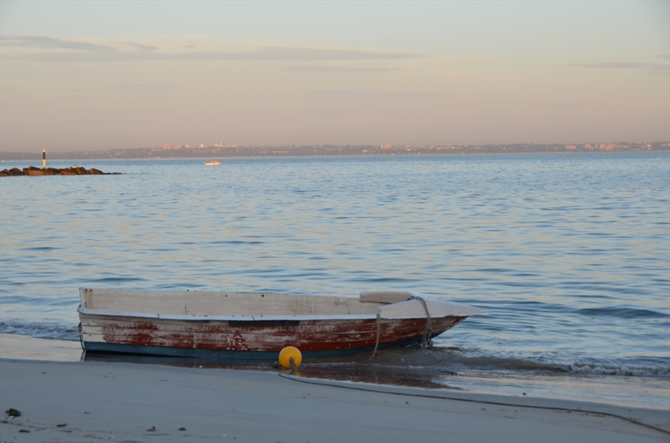 This boat, although old and battered, has a very fitting compariosn to whats happend to the land and bay around it.