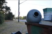 Before a warning to those who dump waste, is a skip full of dumped rubbish and chemical containers. But this was nothing compared to the small, illegal dumps just metres from road, obscured by the marsh.: by lookcloser, Views[267]