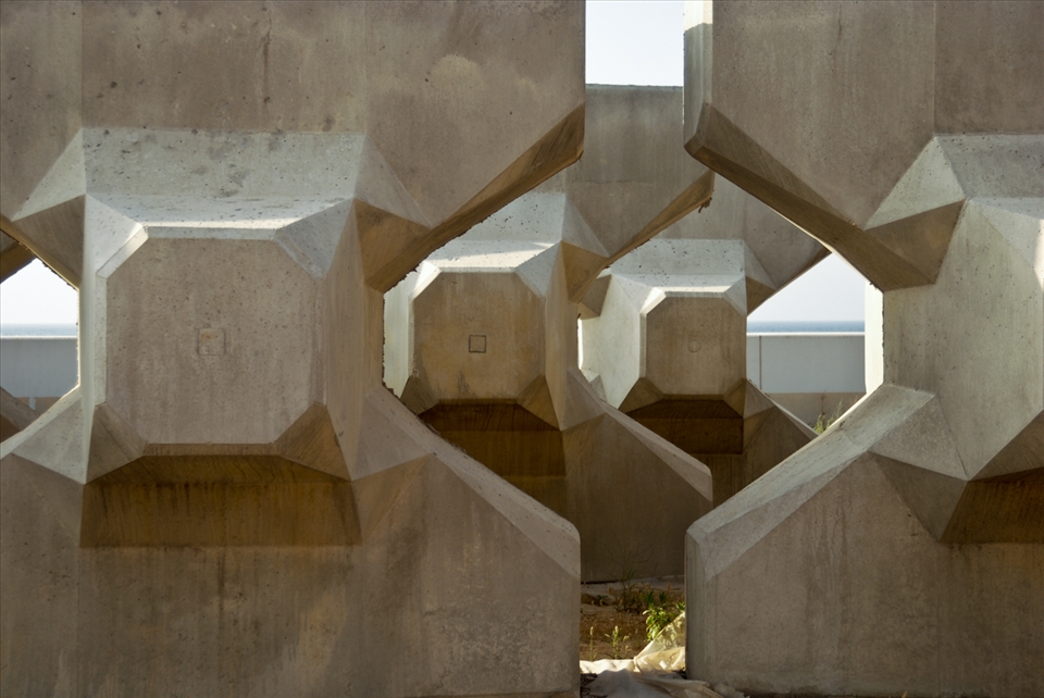 Meanwhile from afar, nature looks calm and forgiving. But somehow she’s always veiled from direct awareness; interspersed by geometrical entities of our making, themselves so innocent, they really have no say in the game, except becoming as silent and gazeful as nature itself.