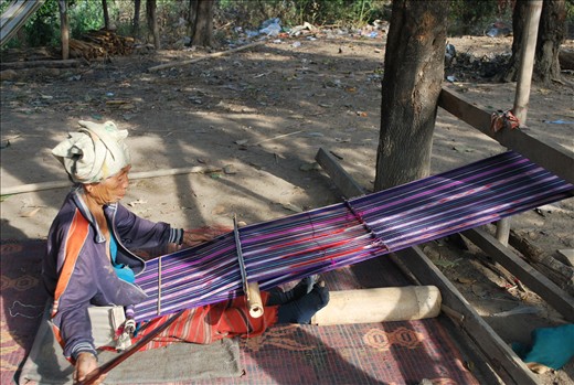 Long hours are spend by the tribe women making scarfs to sell. 