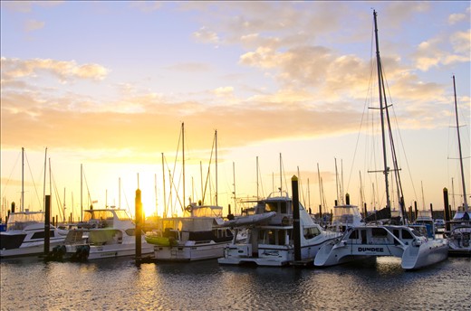 As the sun rises it warms the boats and people stir to start the day.