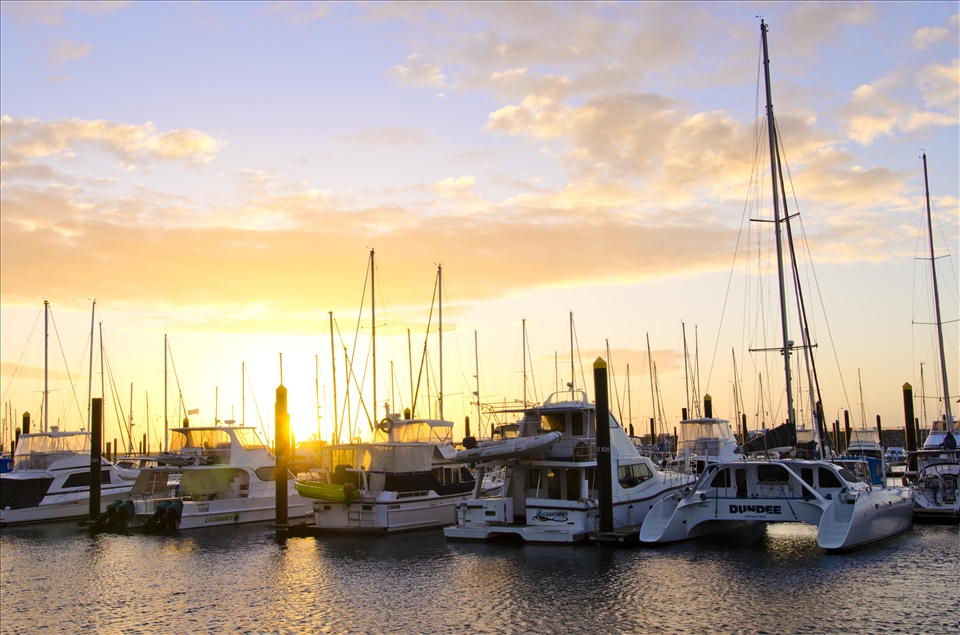 As the sun rises it warms the boats and people stir to start the day.