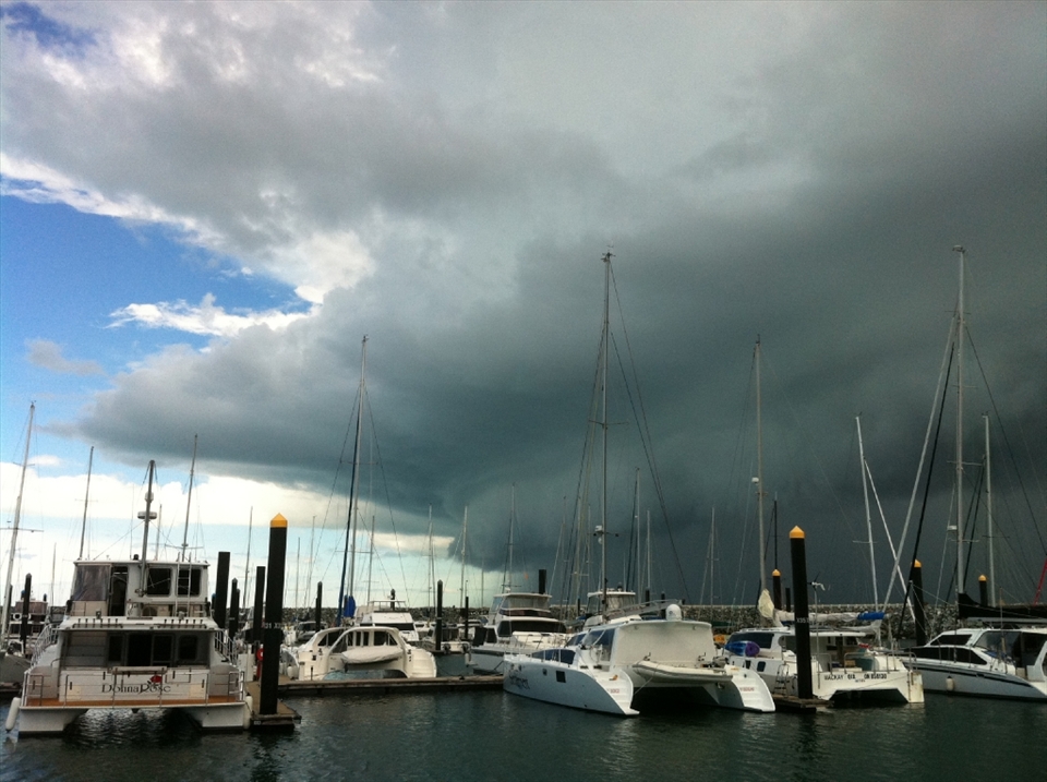 Captured on an iPhone. This stormed rolled through quickly with no time to get out another camera. Many boats in the marina were damaged by the mini tornado that followed.