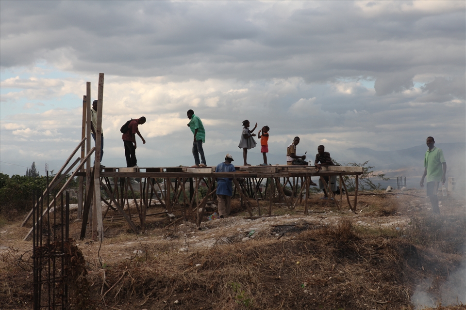 My day was coming to an end and I was making my way back to the team house when I spotted a group of men rebuilding a structure on top of a hill. I was ecstatic to see this, for to me it symbolised the rebirth of Haiti after the Earthquake. To me it represented the resilience, pride and determination the Haitians have. Even though most have lost everything including loved ones, they still wear a smile on their face and remain hopeful that things will get better. They make something out of nothing and life goes on somehow. 