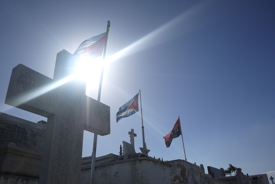 the flags proudly mark the fallen Cubans hailed as martyrs of the revolution