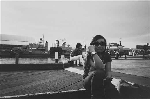 Waiting exhausted at the warf during peak Sydney harbour cruise season, late December