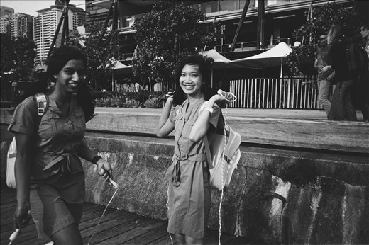 See these two girls skiping rope by the harbour. They are part of corporate movie channel launch, paid cos-players.
