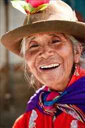 I met this beautiful potato seller at the famed Andahuaylas market in the central Andes, just north of the Sacred Valley. The rich soil allows for the cultivation of many crops, and the land is irrigated by waters flowing down from the higher peaks of the Andes.
The market is almost 3 kilometers long, selling everything from second hand clothing to livestock, vegetables and cheap chinese imports. Spices enliven the air and the colours and motion of the place is overwhelming. Farmers from the country, carrying sacks full of hundreds of variety of potatoes (a crop native to Peru), sell their wares on the large concrete pavements set up for stalls, shouting prices and flagging down potential customers. Should you feel the need to escape the chaos, just cross the river to the livestock section, buy yourself a horse and ride off into the sunset.: by loverock, Views[968]