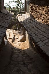 Traditional conical basket in courtyard in sunlight: by lucyflatman, Views[313]