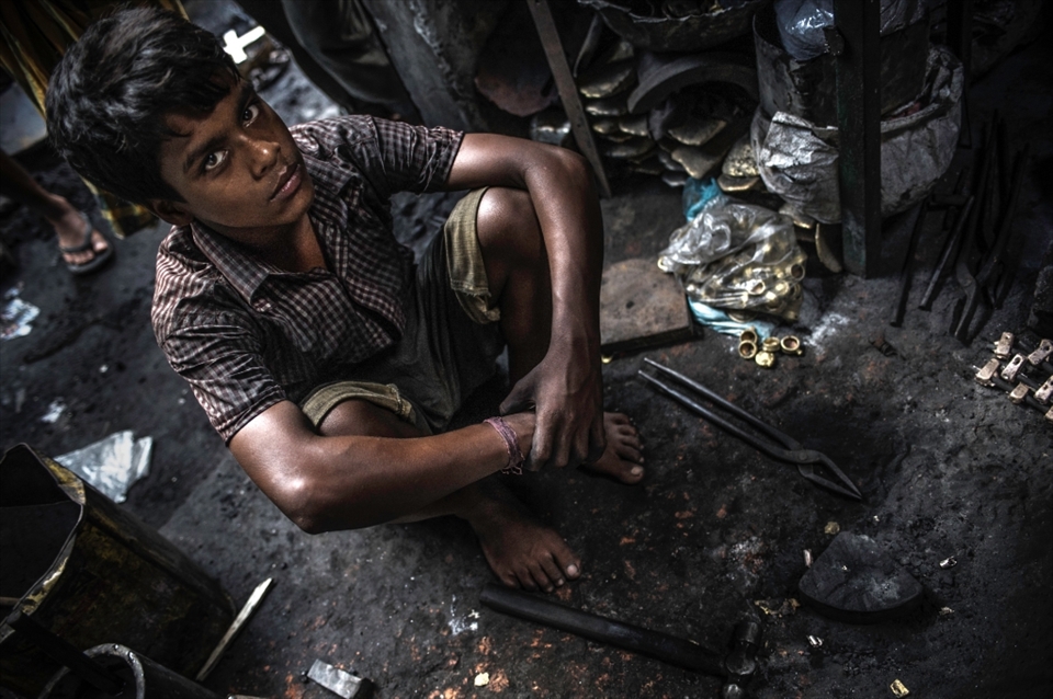 Bachir is 12 years old and has been working at this iron melting factory for the past 5 years so he could help his mother. There are 650.000 to 2 million street children in Bangladesh. Others are 