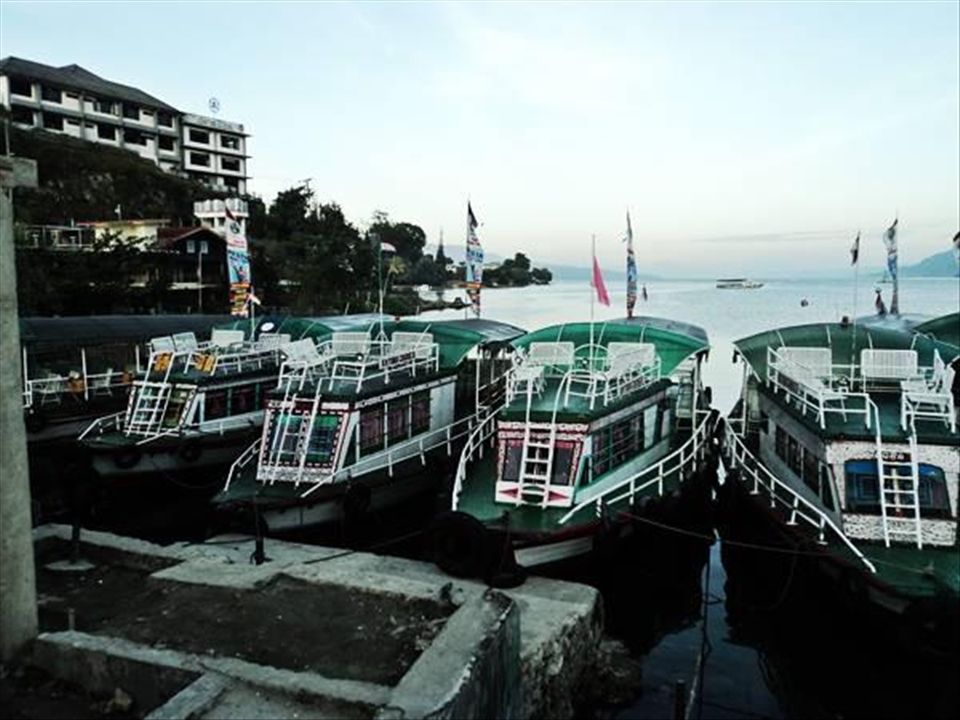 Toba boat engine that can help you to sail around Lake Toba.