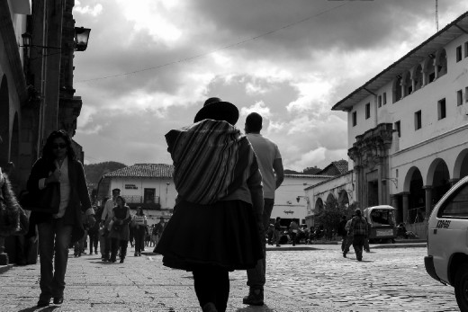Natural high.
While I can hardly keep my breath at such heights, this woman walks up the dizzy streets of Cusco, carrying her belongings with ease.