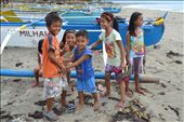 SWEET SMILES- While preparing for a team building activity at the shoreline I met this group of kids from the Fisherman's Village of Darapidap, Ilocos Sur, Philippines. They gave me their sweet smiles despite of the gloomy weather that afternoon.: by lybz, Views[313]