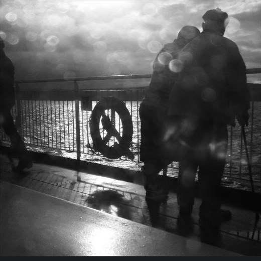 Love through a grey storm - No emotion is stronger. 