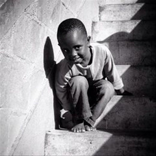 Inspiration among poverty & happiness created by human connection.