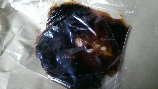 Some food from a vendor. Glutinous rice, coconut and sugar, I think