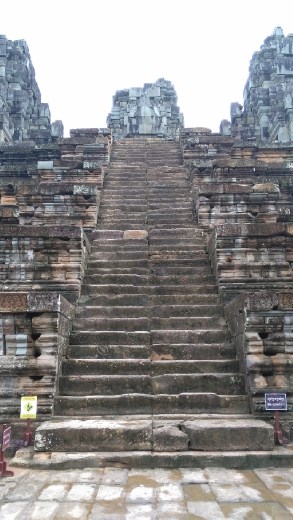 Climbing to the first level of Ta Keo