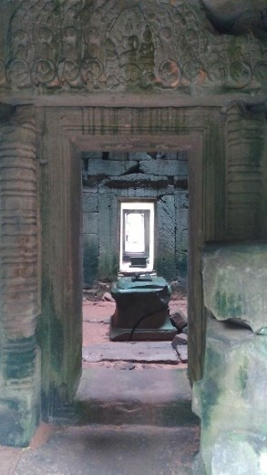 Room containing broken Buddha Statue