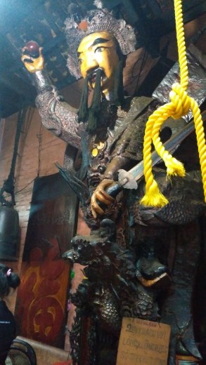 On the right, a statue of the general who defeated the Green Dragon, underneath