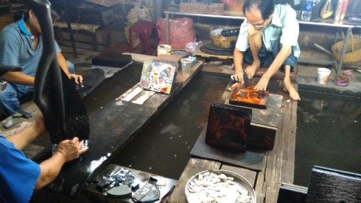 Mother of Pearl wood art made by victims of agent orange