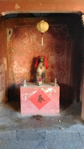 Dog guardians at eastern entrance of Japanese Covered Bridge
