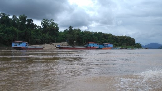 Scene from Mekong River - Boat Houses