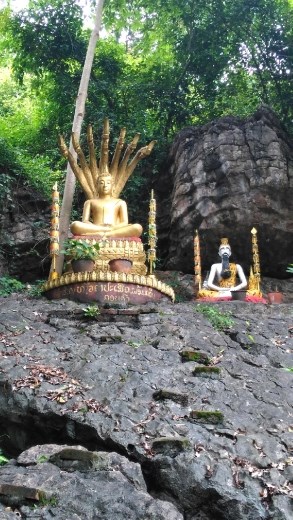 Random statues on Mount Phou Si