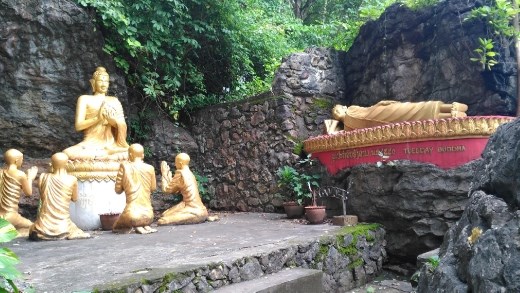 Random statues on Mount Phou Si