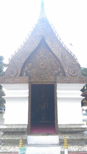 The library housing a standing Buddha