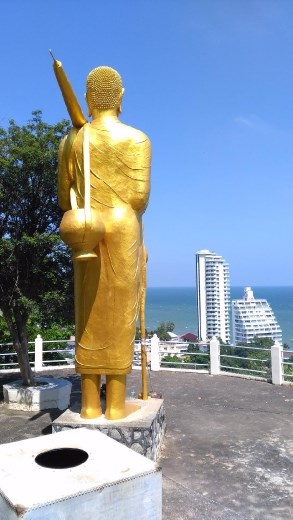 Buddha staring wistfully at the over development