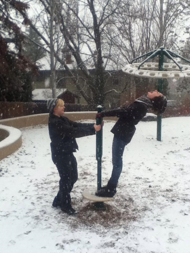 Two of my friends having fun in the snow. 