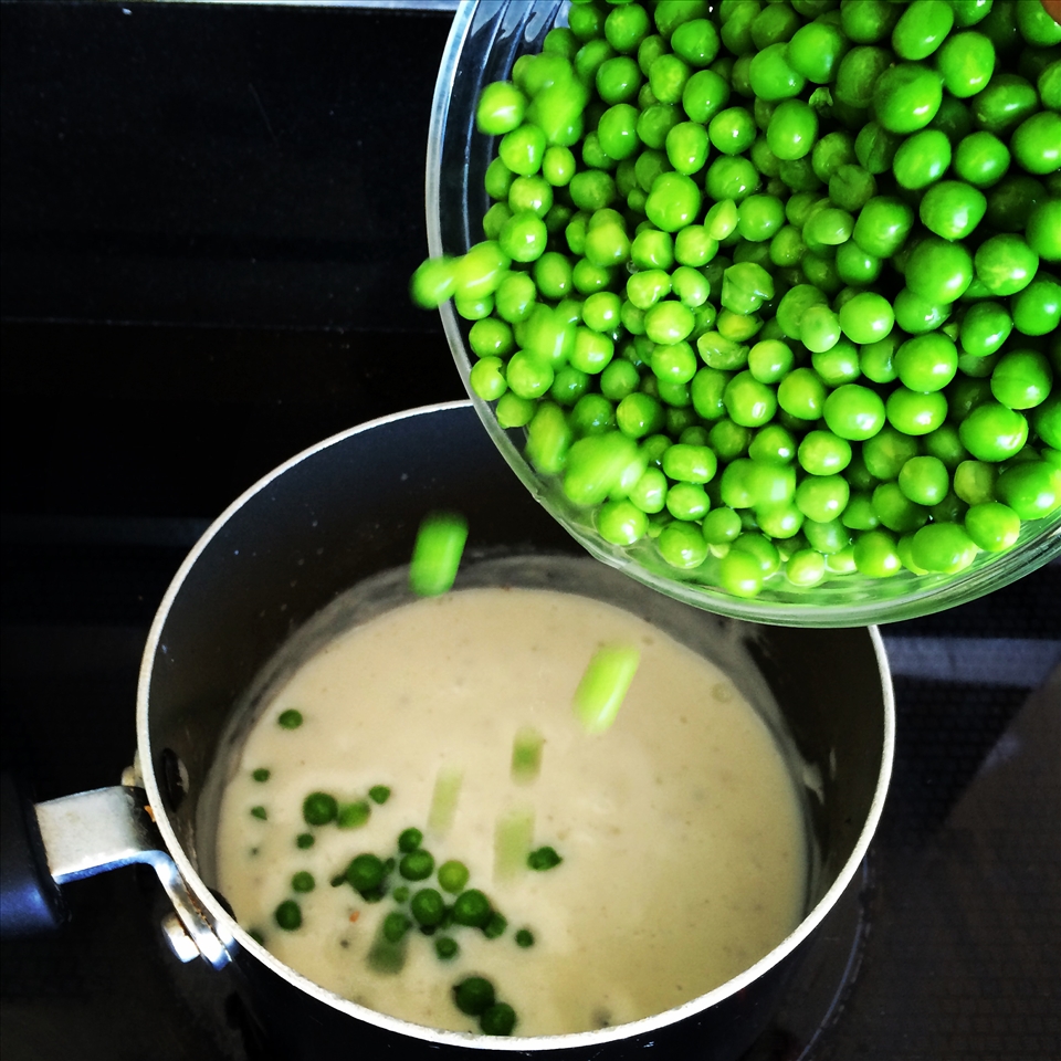 adding the peas
