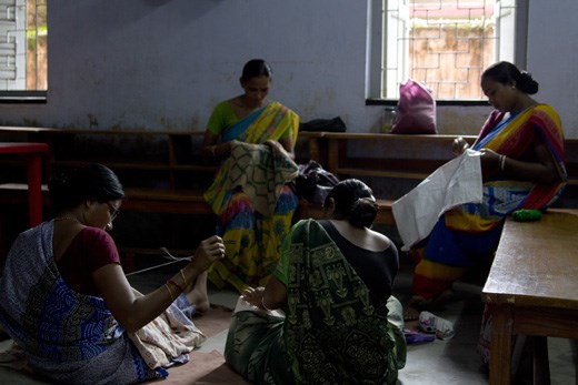 
Women from a village near Madurdaha embroider bags at Dakshini Prayash, a Calcutta based NGO that assists them to market handmade goods. The society also holds training sessions, including sewing classes, which impart the skills necessary for these women to become self-sufficient. 
