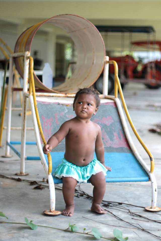 The sad eyes of a Ban Lion girl