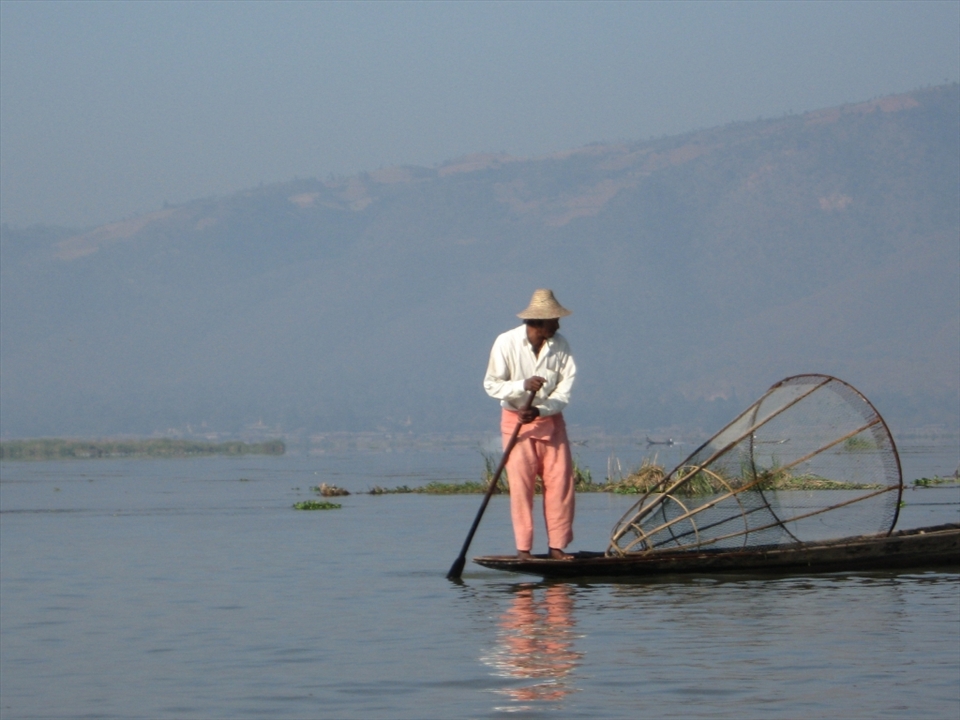 A famous local leg-rowing fishermen from the Intha tribe on Inle Lake.
