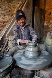 Man making pots at the Pottery Square, Bhaktapur: by mahadevrojastorres, Views[431]
