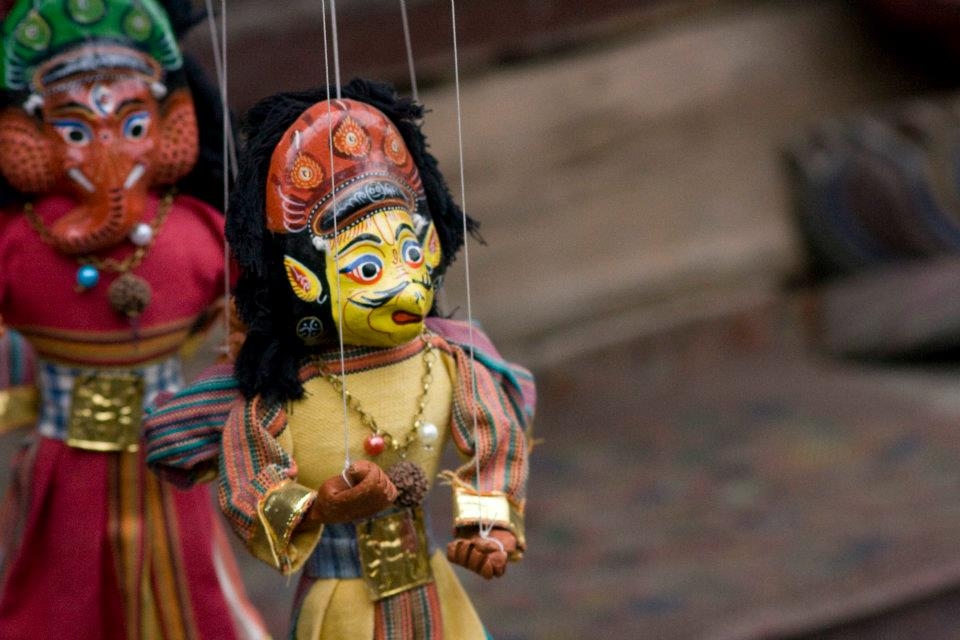 Puppets hanging in the ropes