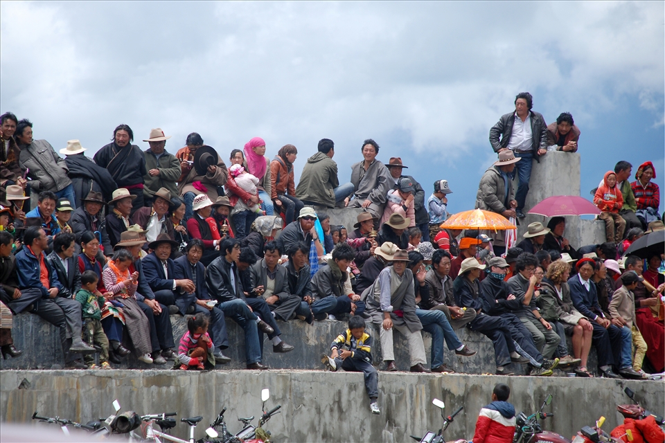 Spectators watch with anticipation