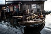 A young kid dirves a canoe in Makoko Slums.: by makoko, Views[317]