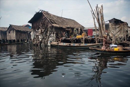 Houses built up of clay soil in the floating slum neighborhood of Makoko in Lago