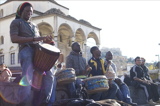 Street  musicians entertaining locals  and tourists, trying to gather some money