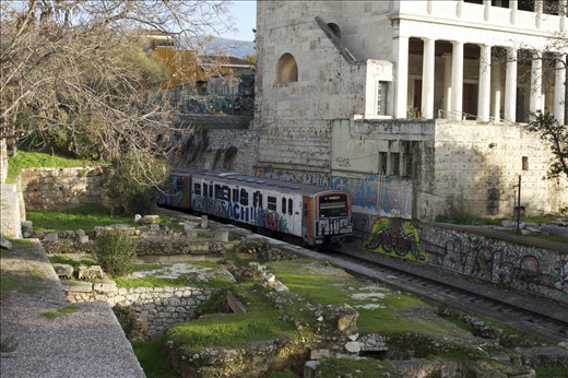 Under the Acropolis, the city train passes through the ancient Athenian market.