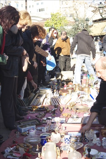 Pedlars selling antiques in the back alleys of todays Athenian market.