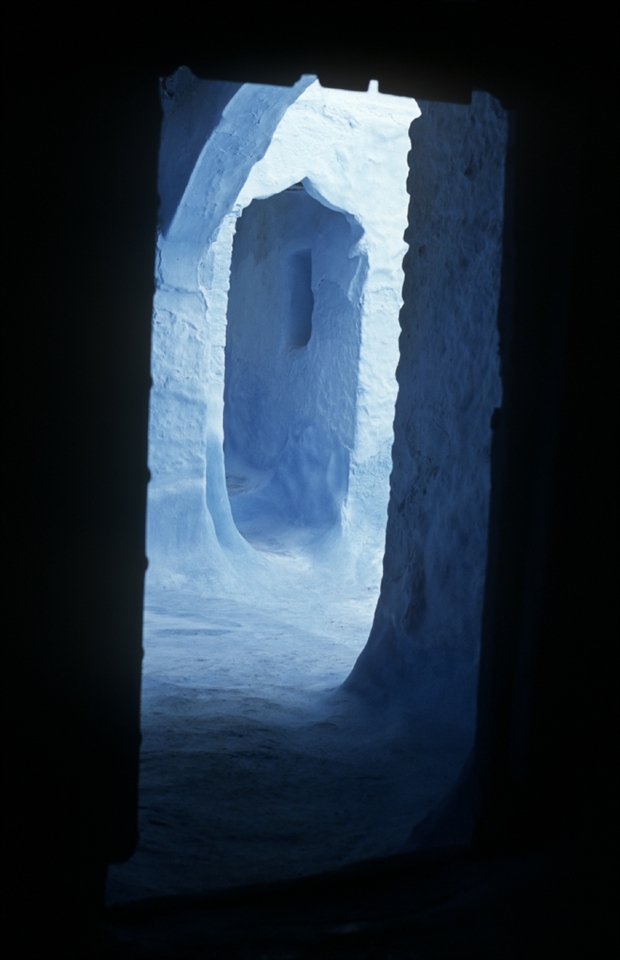 The photo was taken at an entrance to a house in the town of Chefchaouen in Morocco in 2003. I have taken the photo with an Olympus OM camera and a 50 mm. standard lens (slide film).