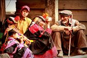 As the day's festivities draw to a close, an elderly Kalash couple surrounded by grandchildren sit on the verandah of their home for a chat. They may be reminiscing about better days, when they were younger, their numbers greater - in the 1951 census of Pakistan, the Kalash population was recorded at 10,000, which by 2012 had dropped to 3,700. They may be ruing the safety of their community, which not only faces pressure to assimilate from their Muslim neighbors, but has also been threatened by the militant Pakistani Taliban. 
<p>
They may be lamenting the gradual loss of their oral traditions. Most Kalash children today go to public schools, where they learn Urdu, the national language of Pakistan. The elders, however, only speak the native Kalasha, according to some scholars the closest modern tongue to Ancient Sanskrit.
<p> 
Although the Pakistani government has applied for UNESCO World Heritage status for the Kalash people, one wonders how long this fabled community can hold together. How much longer can they can preserve their ancient ways, their secrets, thus far protected by the forbidding Hindu Kush, dating to a time and place that only exists in legend?: by manalahmad, Views[521]